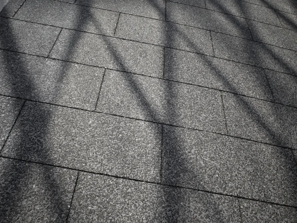 View of an abstract outdoor scene in daylight with soft shadows and minimal shapes.