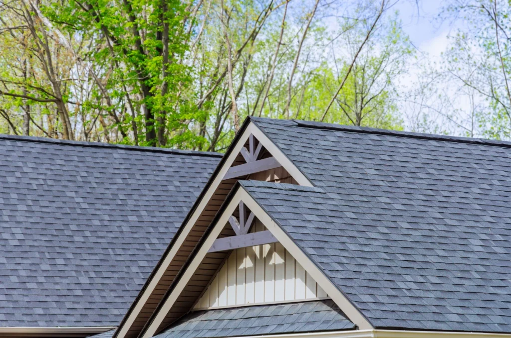 Finished asphalt shingle roof after roof damage repair helps protect the home after emergency roof leak repair is checked. 