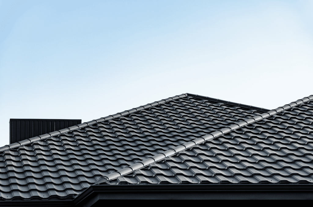 Finished roofing system showing new roof materials after full roof replacement planning for a Boston home exterior project.